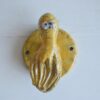 gancio appendiabiti in ceramica raku polipo giallo